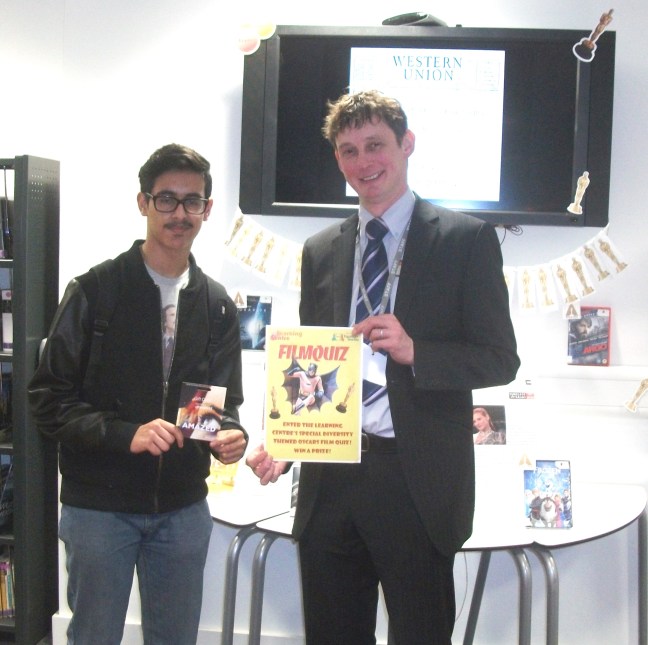 film quiz winner accepting his prize