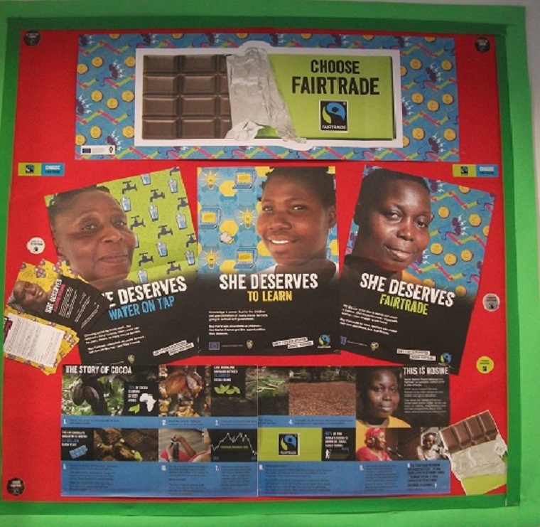 The Library's 'Fairtrade' display. Including the Fairtrade posters 'She Deserves to Learn' and 'She Deserves Water on Tap'.