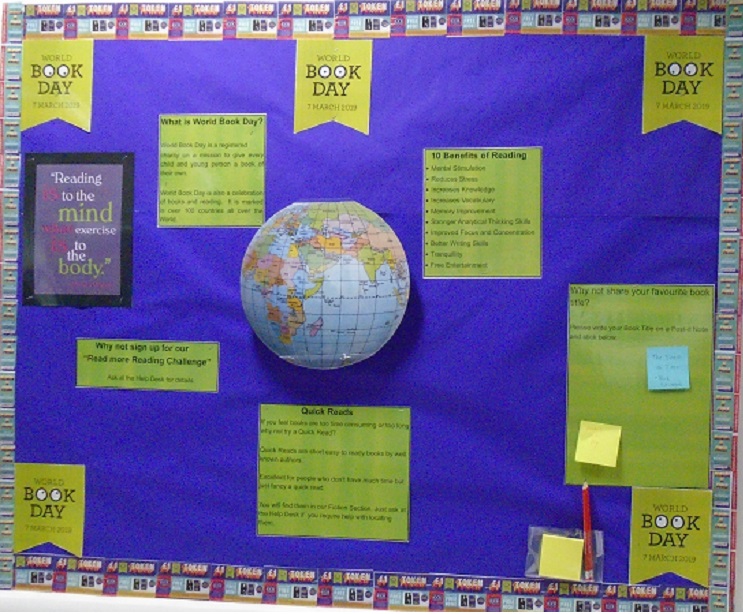 The Library's 'World Book DAY 2019' display describing what World Book Day is, ten benefits of reading (including reducing stress) and the quote "Reading is to the Mind What Exercise is to the Body".